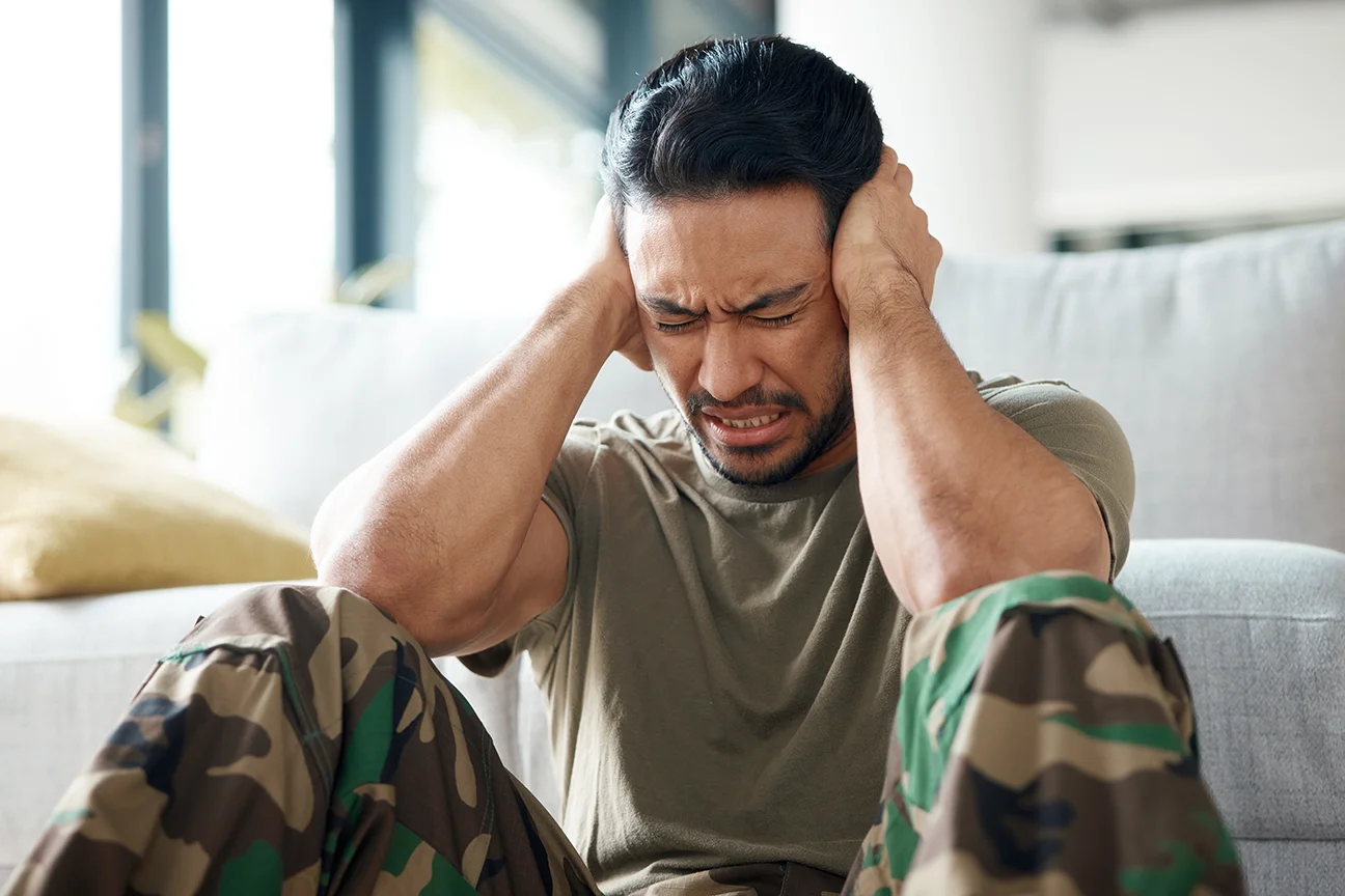 Stressed Latin Soldier sitting on the floor